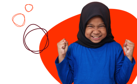 A young child wearing a blue shirt and black hijab smiles and clenches their fists in a joyful, triumphant pose against a background with red and orange circles.